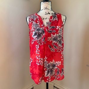 Pink and flowery sleeveless top